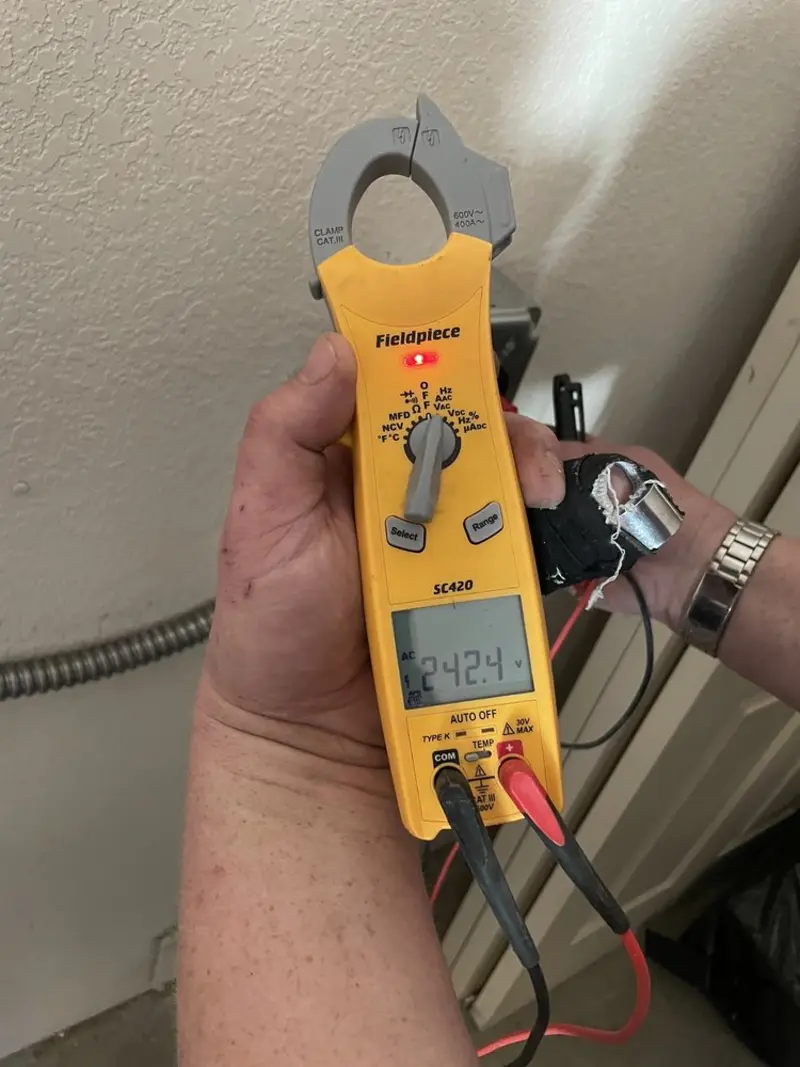 Voltage testing with clamp meter during Generator Installation in Port Angeles East